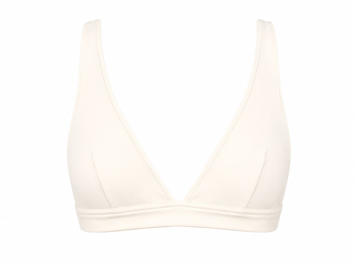 Peto triangular deportivo Aura en blanco crema de LYA Studio, foto principal